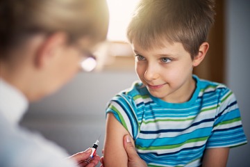 little-boy-having-a-vaccination-injection 360 x 240